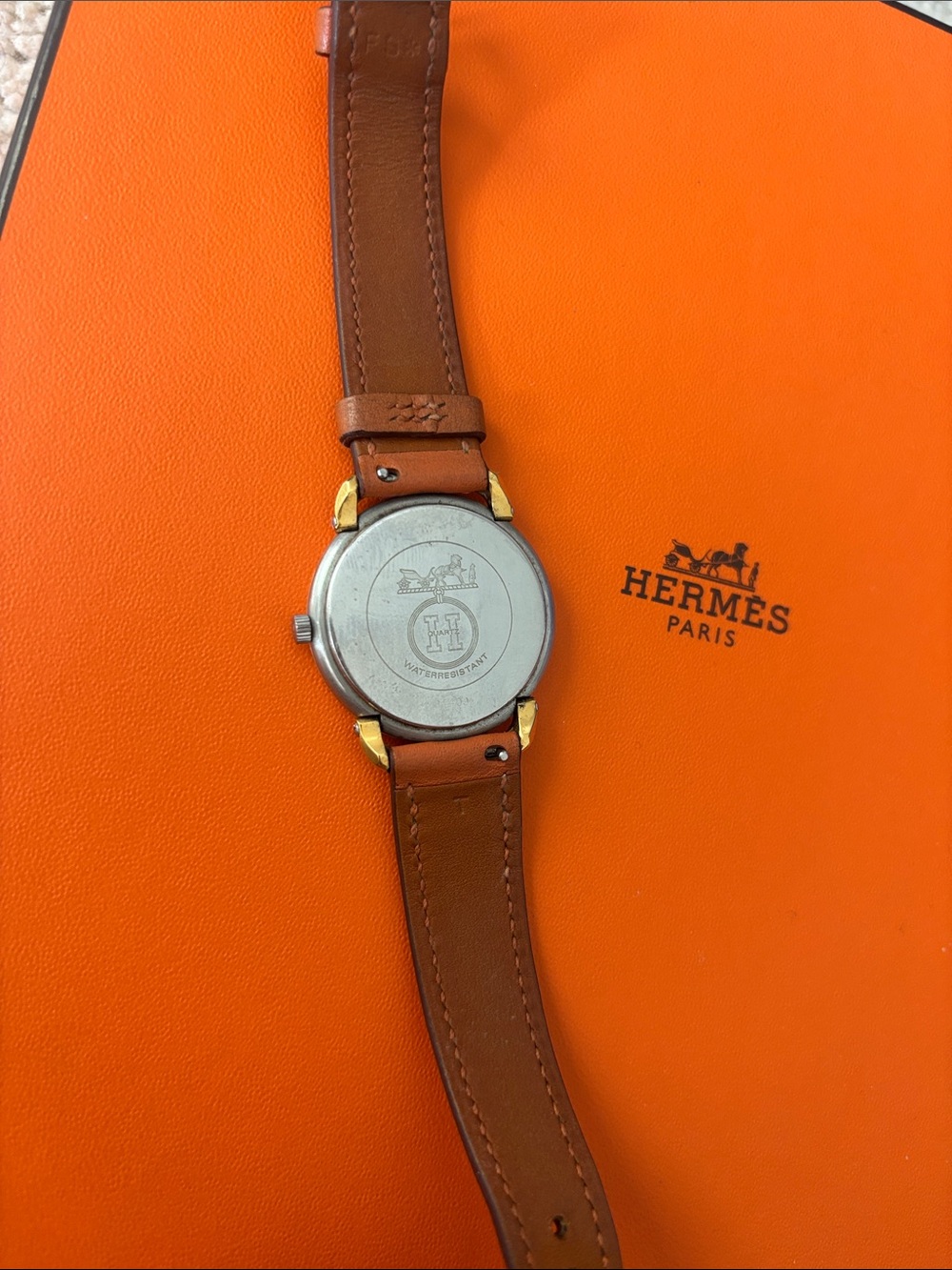 Authentic Hermès orange Leather Strap Gold and silver Tone Round Dial Watch - Picture 3 of 7
